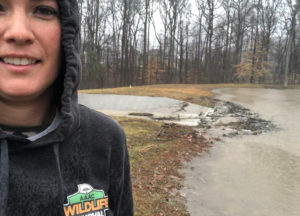 Wildlife removal owner in a field